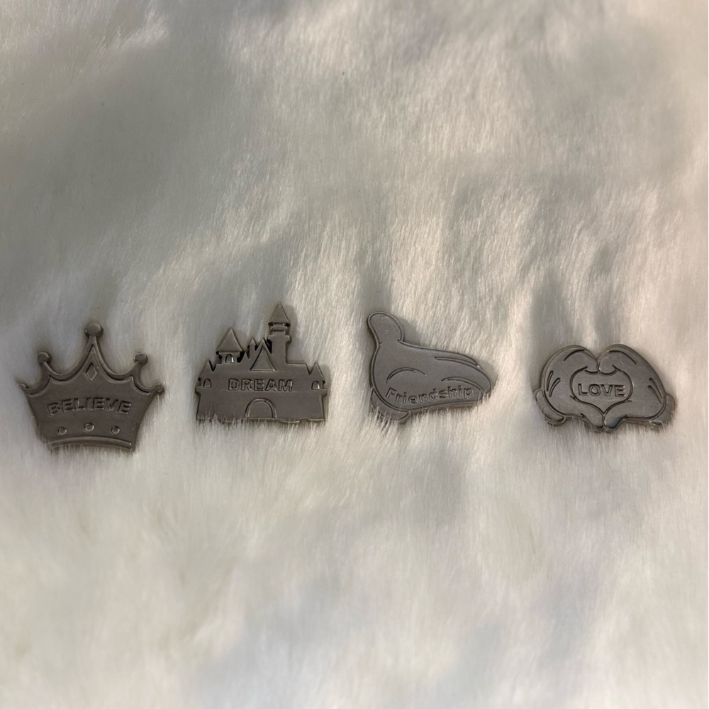 Disney Coins/Charms- set of 4